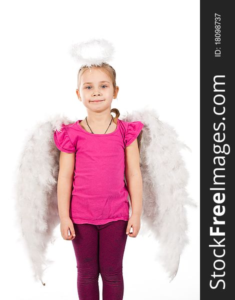 Beautiful girl in angel wings and nimbus