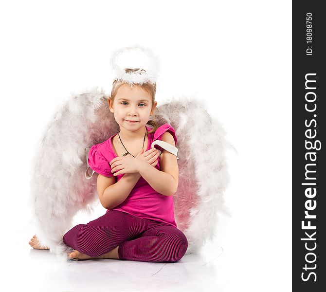 Beautiful girl in angel wings and nimbus isolated