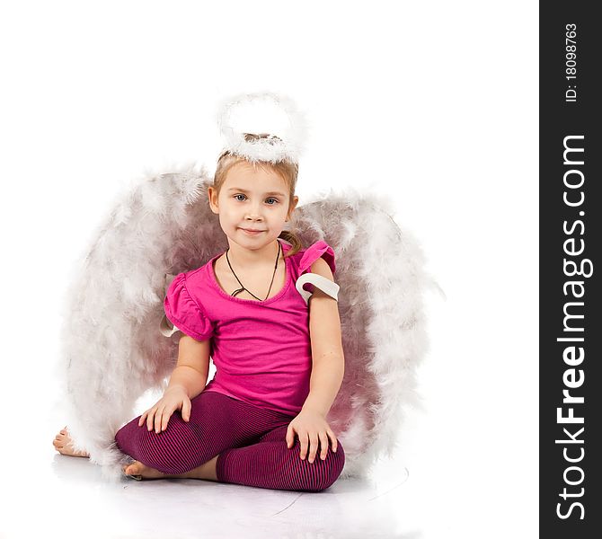 Beautiful girl in angel wings and nimbus isolated