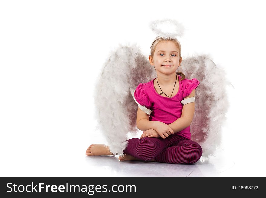 Beautiful girl in angel wings and nimbus isolated