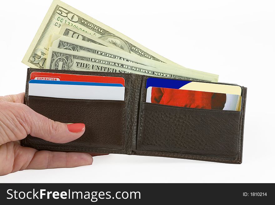 Image of a woman's hand holding a working man's wallet over a white background. Image of a woman's hand holding a working man's wallet over a white background