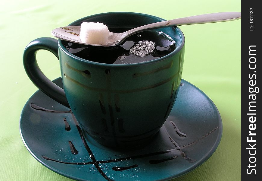 On a photo a cup with it is expected also cubes of lump sugar. The photo is made in Ukraine. On a photo a cup with it is expected also cubes of lump sugar. The photo is made in Ukraine