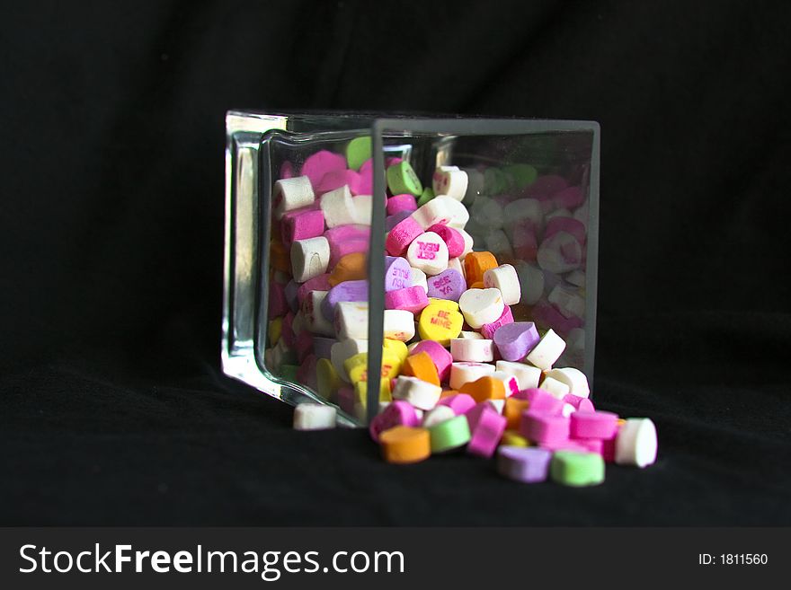 Valentines Candy spilt from a jar. Valentines Candy spilt from a jar