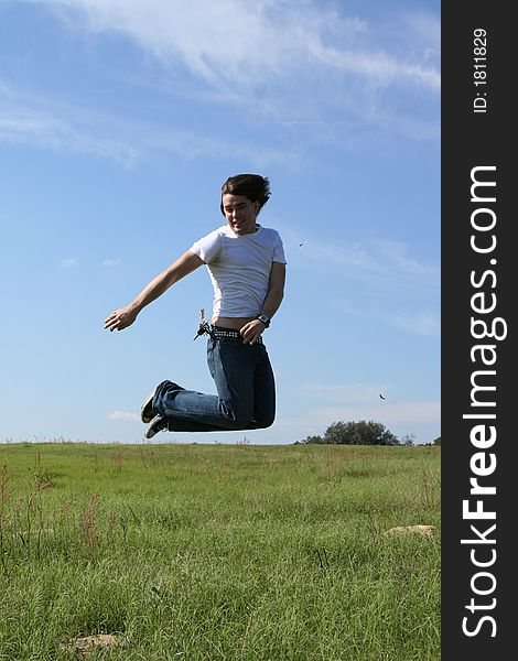 Photo of a young man in a field jumping up in the air

~Happy Hill Road~. Photo of a young man in a field jumping up in the air

~Happy Hill Road~