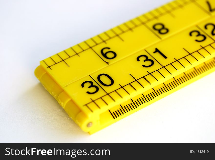 A yellow ruler used for measuring
