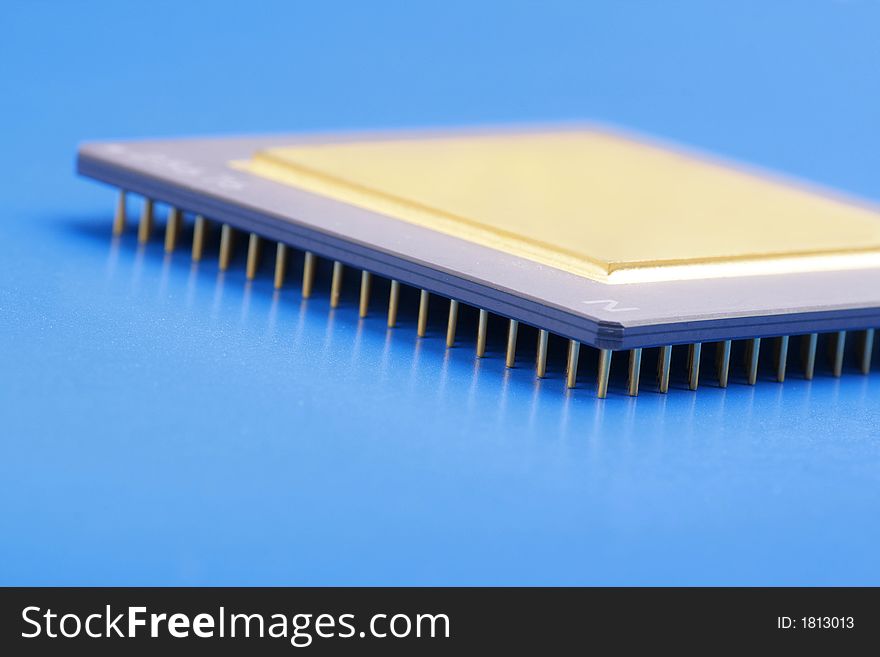 Close view of Computer CPU. Processor on blue background. Soft focus.