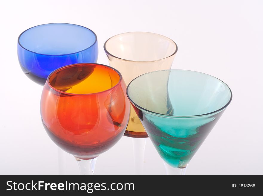 Shoot of 4 colour glasses on a white background. Shoot of 4 colour glasses on a white background