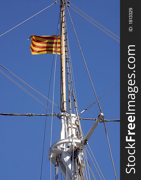 Detail view of a mast with the Catalan flag at one of the ships docked at the Maremagnum complex at the city of Barcelona, Catalunya, Spain, Europe