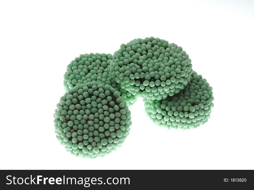 Candies with small green balls. Candies with small green balls