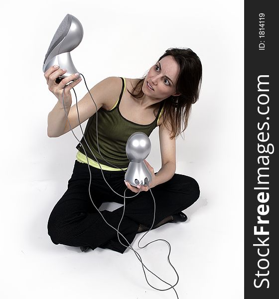 Woman and strange silver speakers. Woman and strange silver speakers.