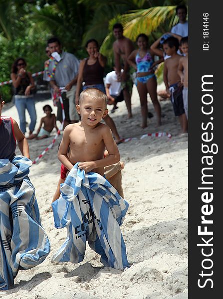 Boy at a bag race on a beach