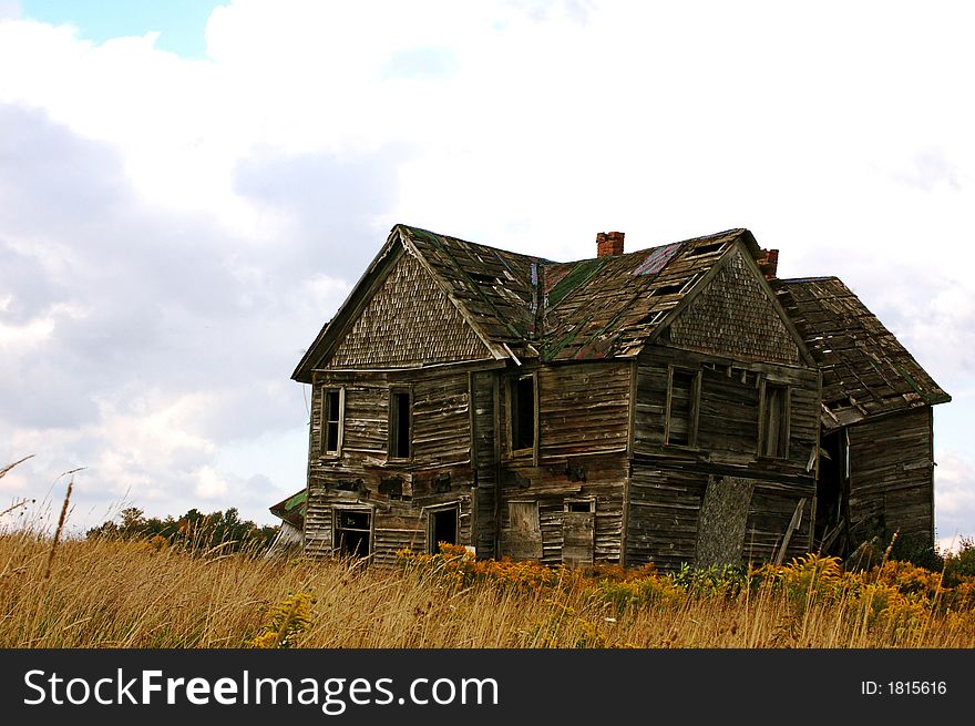 An old abandoned house during the autumn season.