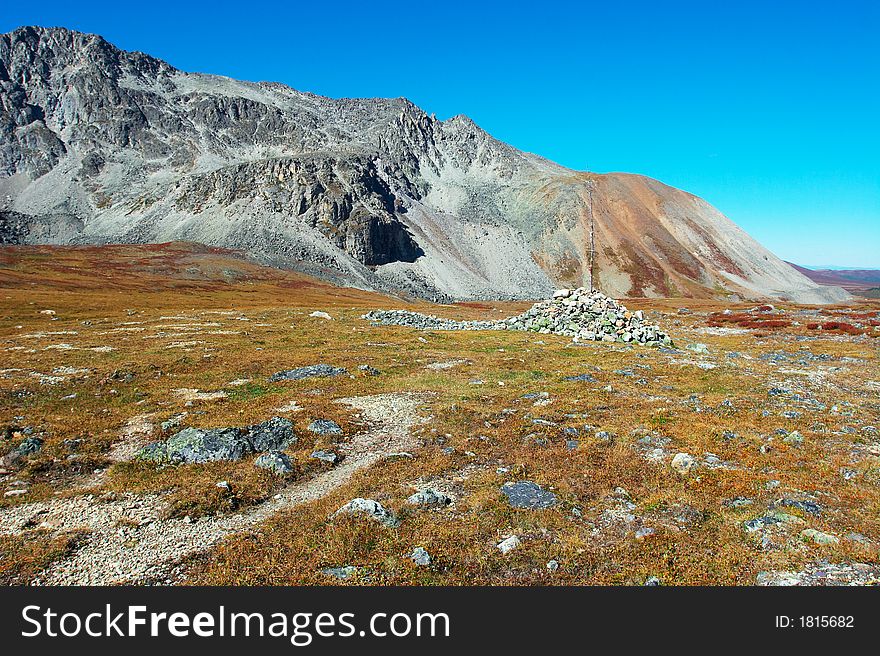 Blue Sky, Rocks And Mountains.