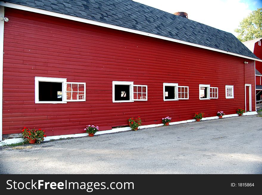 Side view of a large red barn at knox farm state park in new york state. Side view of a large red barn at knox farm state park in new york state.