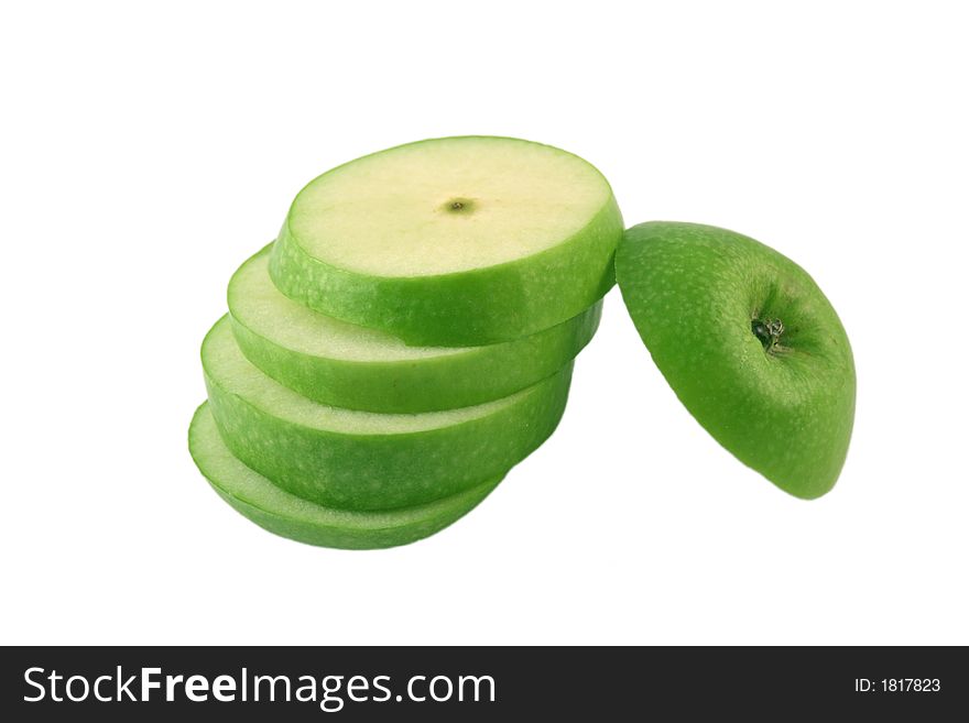 Green apple slices on a white background