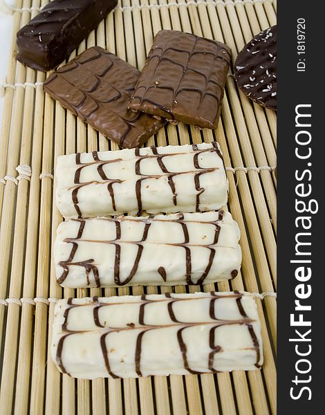 White chocolate cookies on bamboo sheet. White chocolate cookies on bamboo sheet.