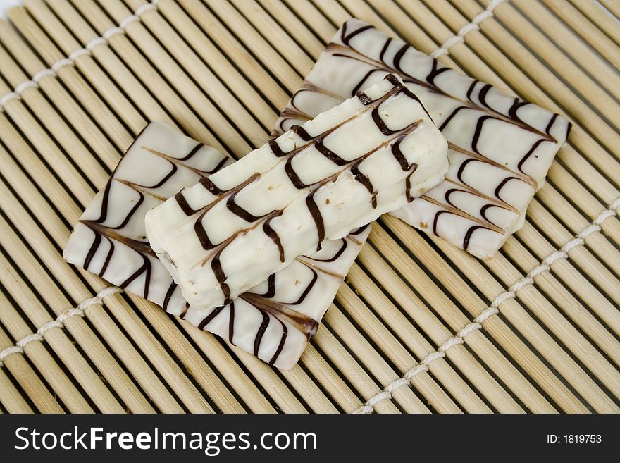 White chocolate cookies on bamboo sheet. White chocolate cookies on bamboo sheet.