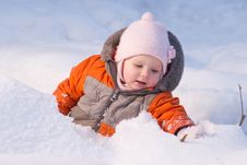 Cute Baby Sit In Snow In Forest And Dig Snow Stock Photos Cute Baby Sit In Snow In Forest And Dig Snow Stock Photos