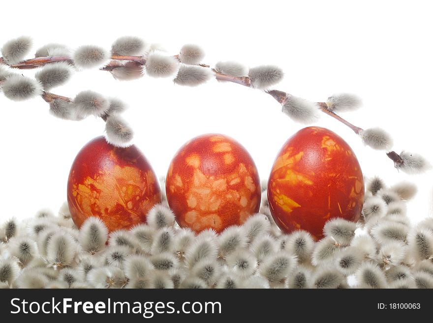 Three red easter eggs with pussy willow on white isolated background. Three red easter eggs with pussy willow on white isolated background