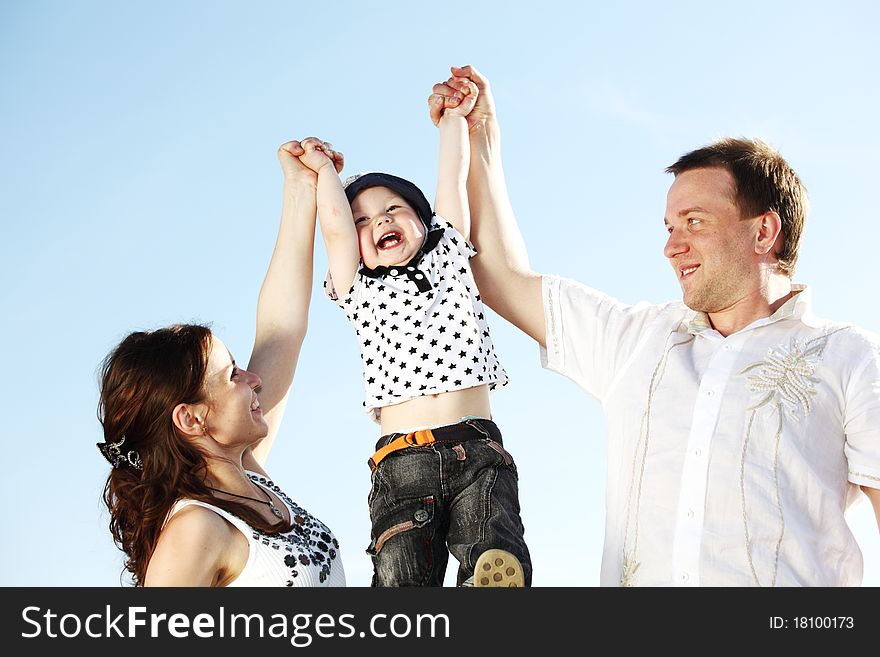 Happy family blue sky on background. Happy family blue sky on background