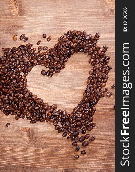 Fragrant fried coffee beans as a heart