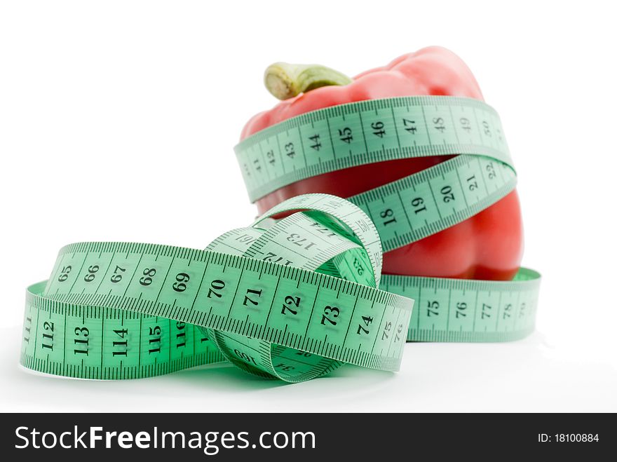 Bulgarian pepper and centimeter, white background, isolated