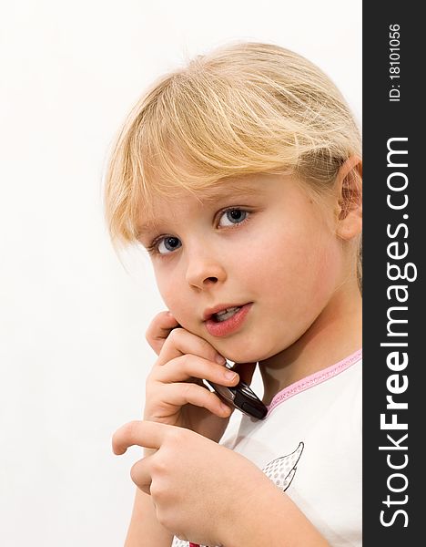 Girl talking on a cell phone, white background