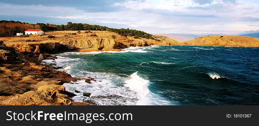 A nice mediteranian setting, with typical coastline, sea under the northern wind influence. Lonely house as a sole observer of an ancient struggle between waves and coast. A nice mediteranian setting, with typical coastline, sea under the northern wind influence. Lonely house as a sole observer of an ancient struggle between waves and coast.