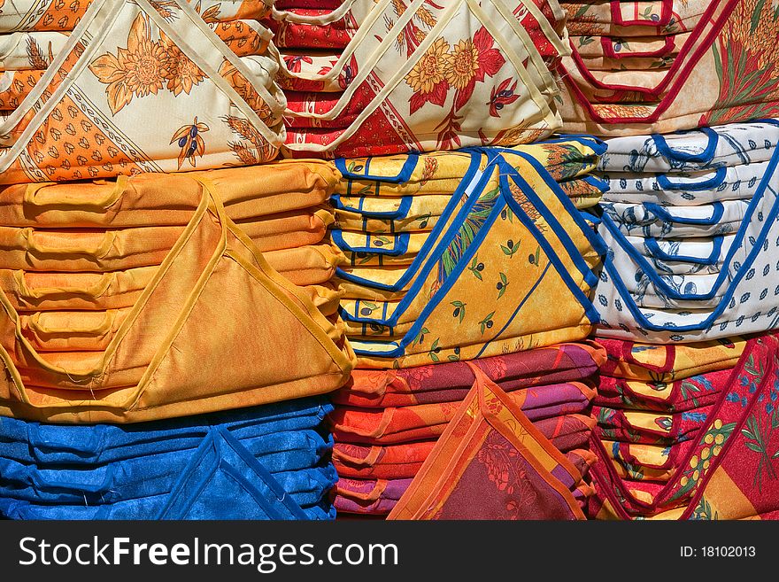 This midday shot of seat cushions was taken in a street market in Provence, France. This midday shot of seat cushions was taken in a street market in Provence, France.