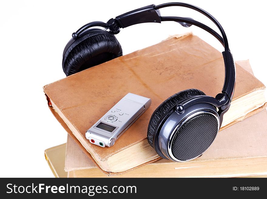 Headsets on the pile of books