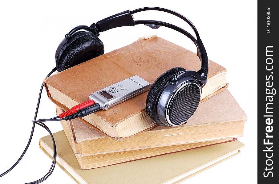 Headsets on the pile of books