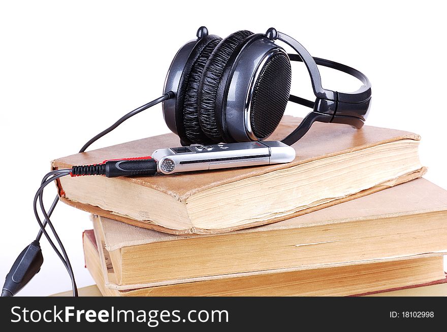 Headsets on the pile of books