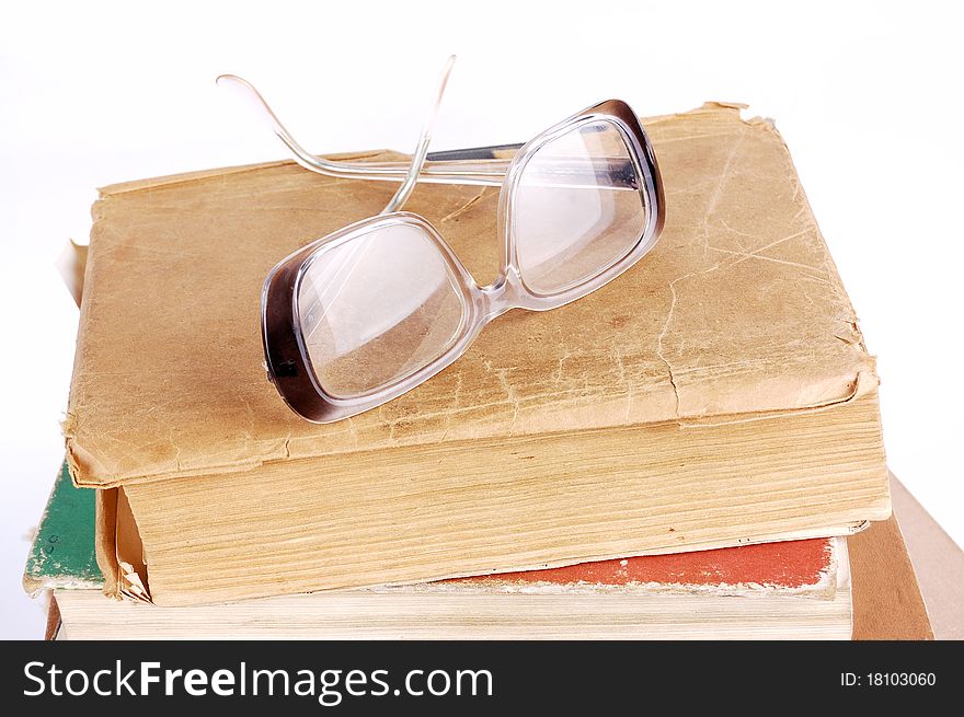 Pile of books on a white background