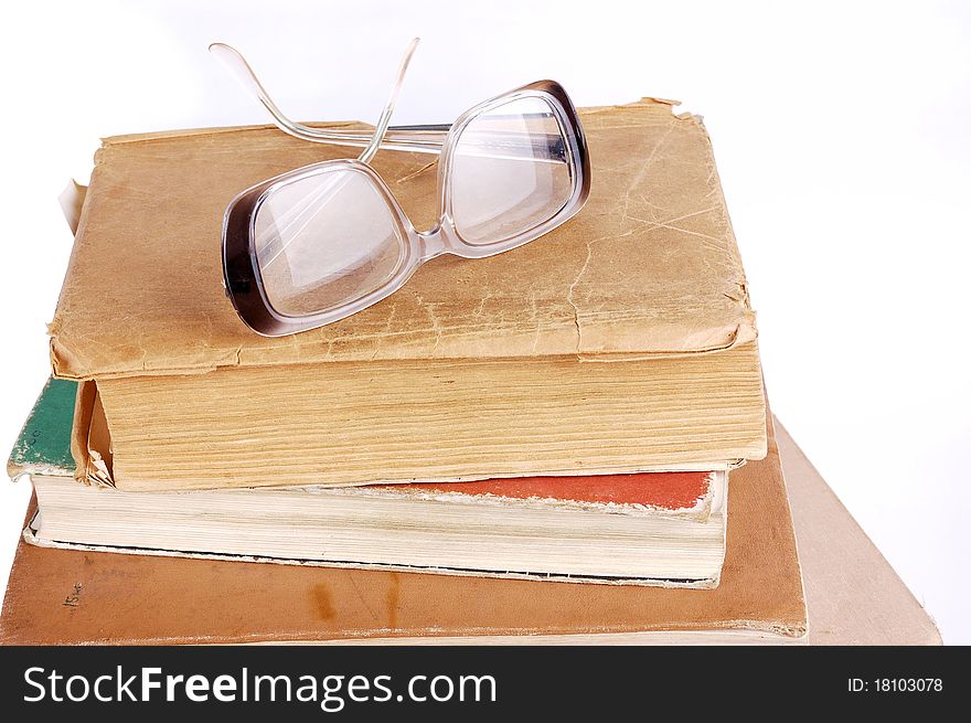 Pile of books on a white background