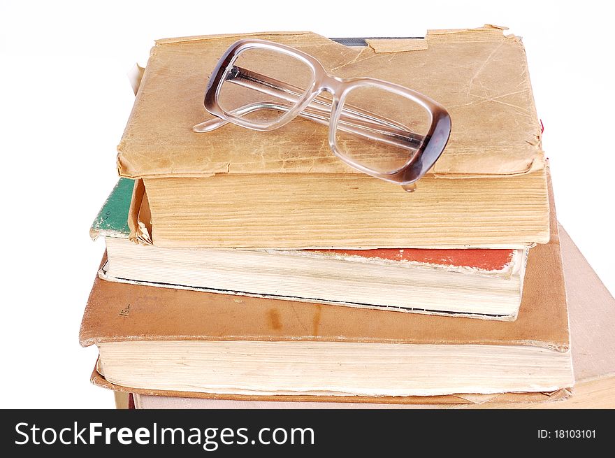 Pile of books on a white background