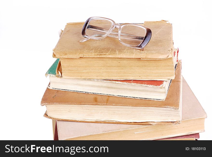 Pile of books on a white background