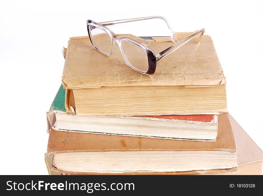 Pile of books on a white background