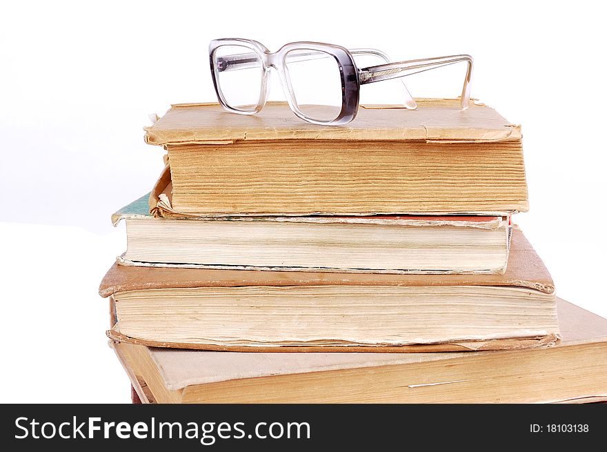 Pile of books on a white background