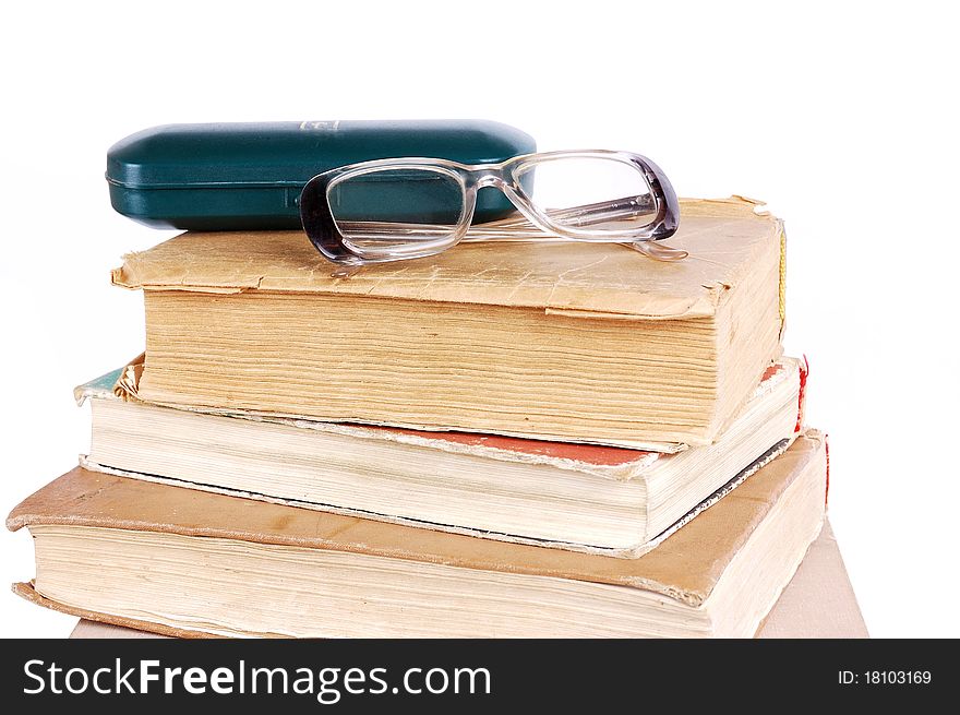 Pile of books on a white background