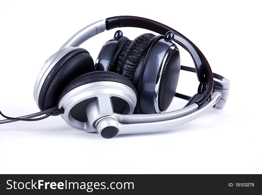 Grey headsets on a white background