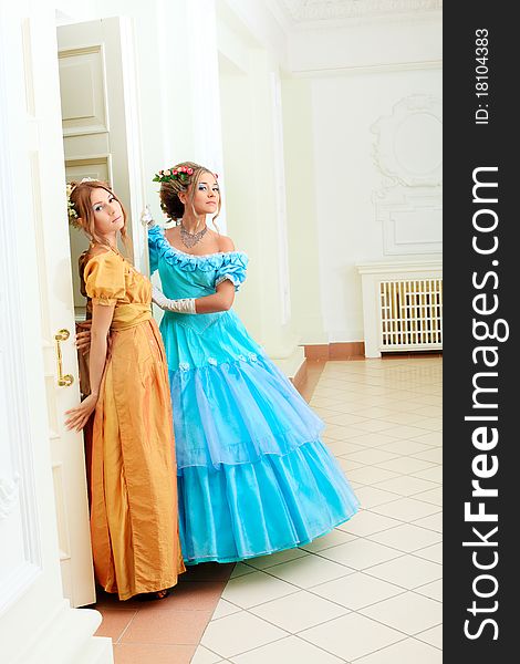 Two beautiful women in medieval era dresses. Two beautiful women in medieval era dresses.