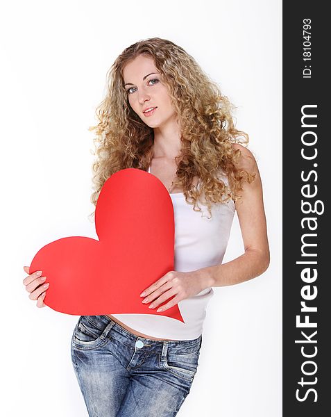 Blond girl with big red valentine card