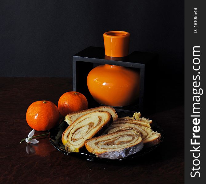 Strudel and tangerines on the table