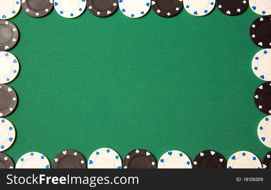 Green poker background with gambling chips all around