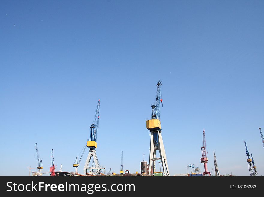 Hamburg Harbor - Cranes In The Sky