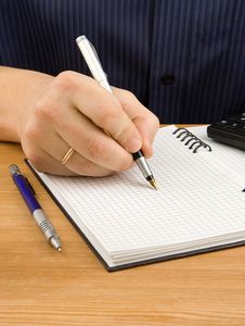 Male Hand Writing By Pen On Notebook Stock Photos Male Hand Writing By Pen On Notebook Stock Photos