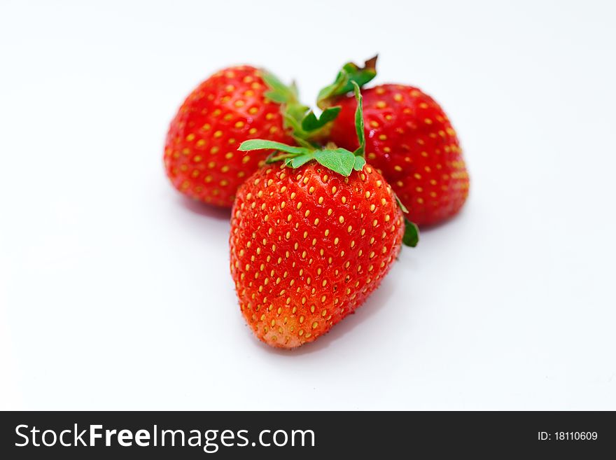 Beautiful strawberries isolated on white, a close-up