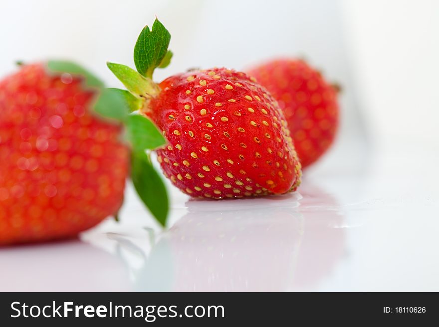 Beautiful strawberries isolated on white, a close-up