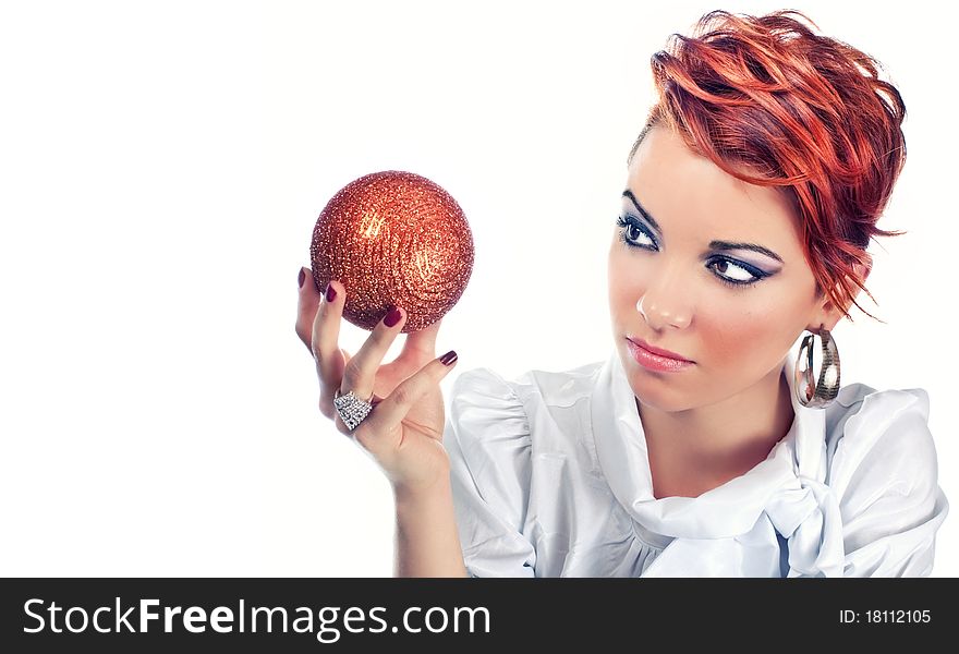 Portrait of happy young women holding and looking orb