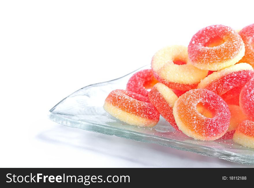 Heap peach bonbons, isolated on white